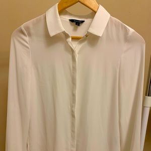White shirt with golden metal button